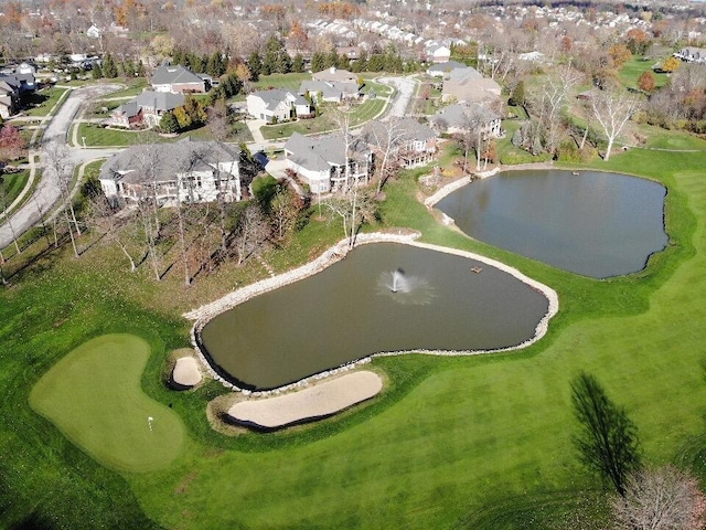 bird's eye view featuring a residential view and a water view