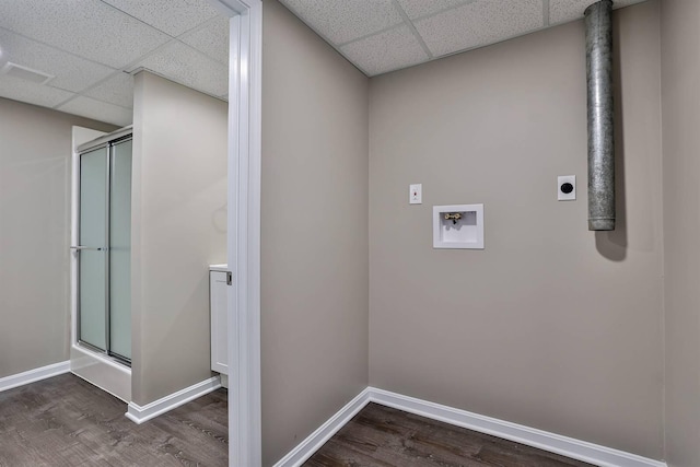 washroom with hookup for a washing machine, baseboards, hookup for an electric dryer, and laundry area