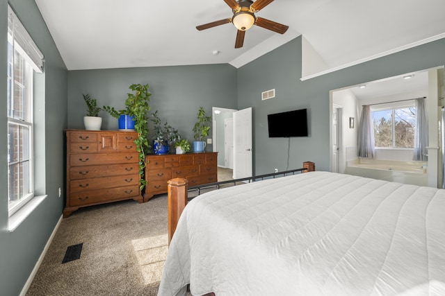 carpeted bedroom with visible vents, a ceiling fan, baseboards, and vaulted ceiling