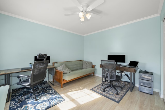 office with baseboards, wood finished floors, and ornamental molding