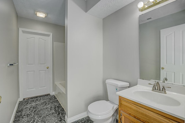 bathroom featuring visible vents, baseboards, toilet, and vanity