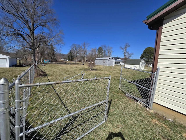 view of yard with a gate and fence