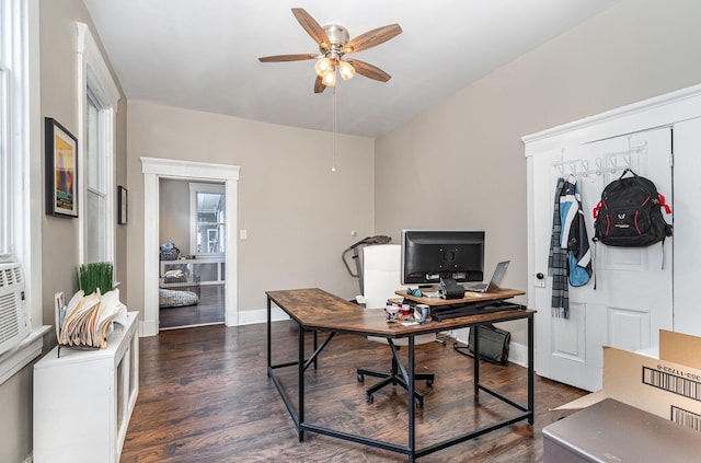 office with baseboards, dark wood-type flooring, and a ceiling fan