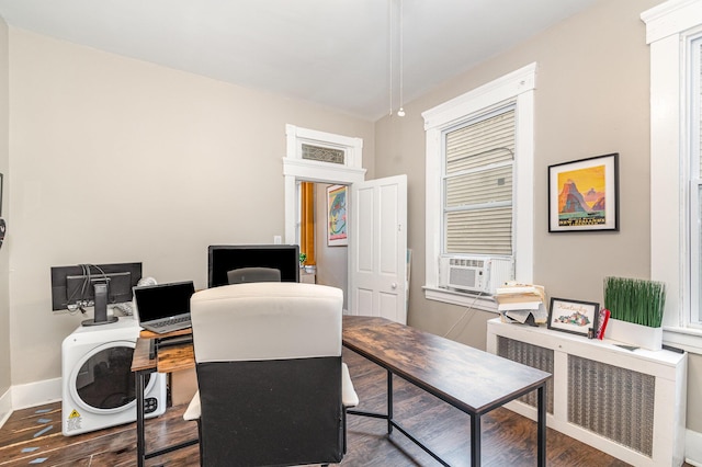 home office featuring baseboards, dark wood-type flooring, radiator, and cooling unit