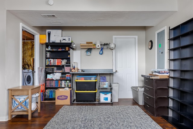 interior space featuring washer / clothes dryer and visible vents