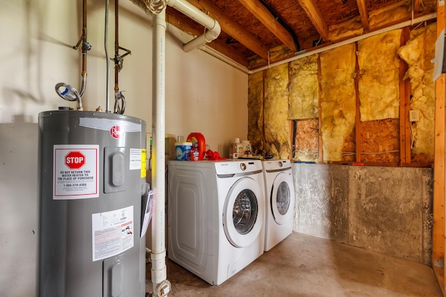 washroom featuring laundry area, separate washer and dryer, and water heater