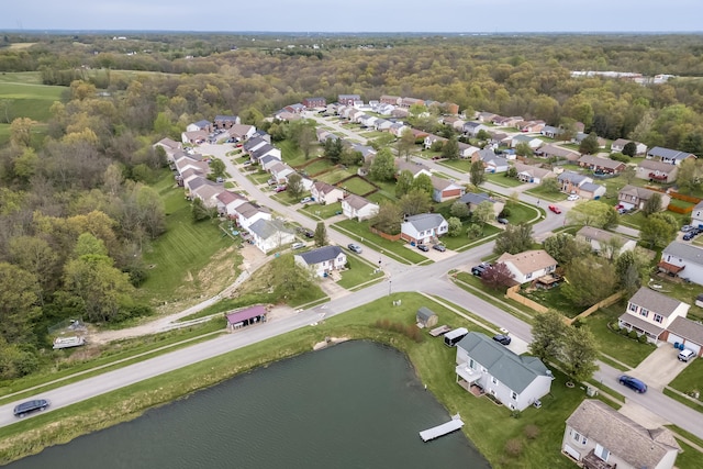 drone / aerial view with a residential view and a water view