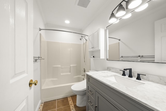 full bathroom with crown molding, toilet, tile patterned floors, vanity, and  shower combination