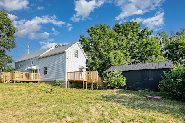 29 Race St, Dry Ridge, KY 41035 - rear view of house with a deck, a yard, a fire pit, and roof with shingles