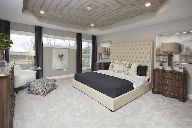 carpeted bedroom with recessed lighting, baseboards, a raised ceiling, and wooden ceiling