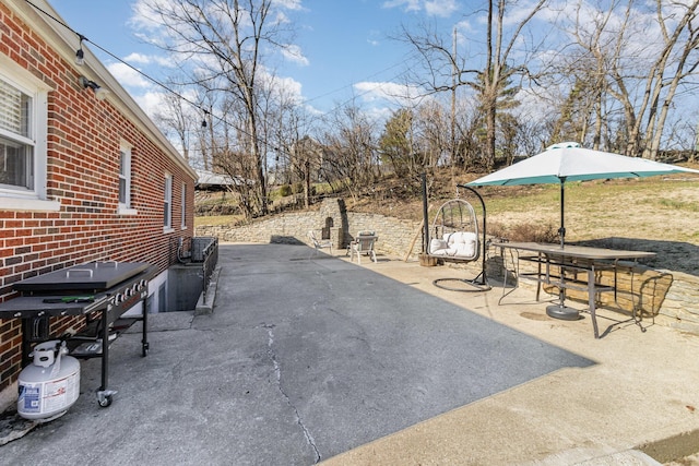 view of patio featuring outdoor dining area