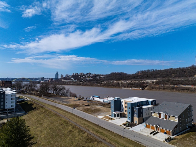 drone / aerial view with a view of city and a water view