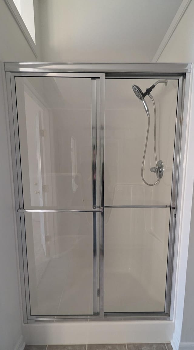 bathroom with a stall shower