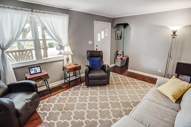 living room with wood finished floors and baseboards