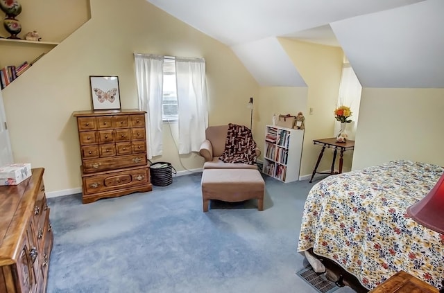 bedroom featuring carpet floors, baseboards, and vaulted ceiling