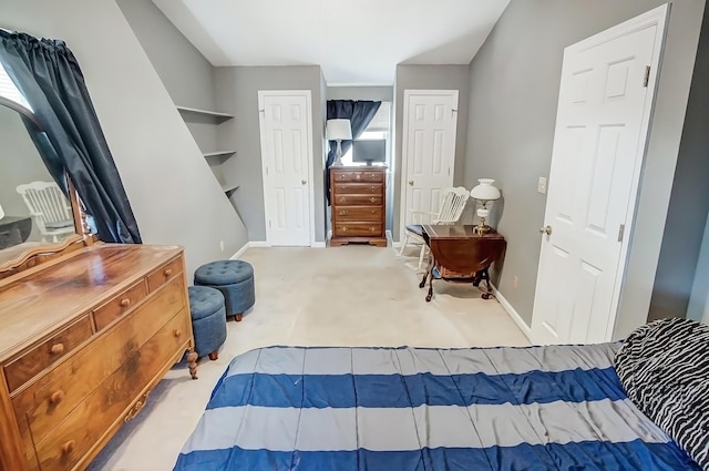 carpeted bedroom with baseboards