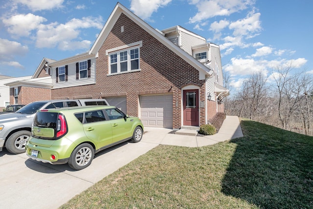 view of front of home with a garage, a front lawn, brick siding, and driveway