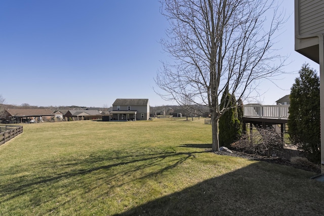 view of yard with a wooden deck