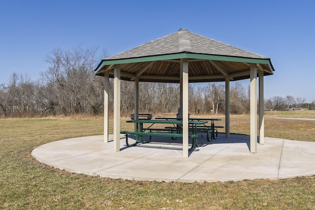 view of home's community featuring a gazebo, a patio area, and a yard