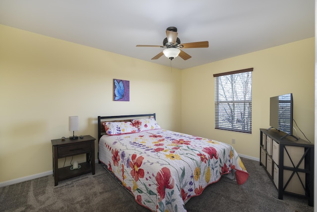 bedroom featuring ceiling fan, baseboards, and carpet floors