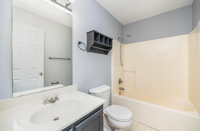 bathroom featuring toilet,  shower combination, vanity, and a textured ceiling