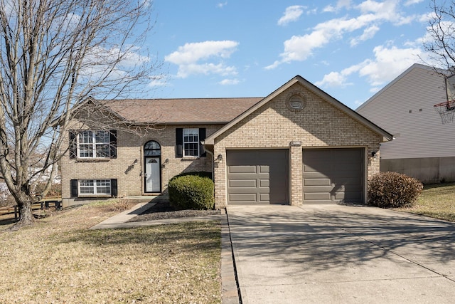 view of front of house with concrete driveway, an attached garage, brick siding, and a front yard