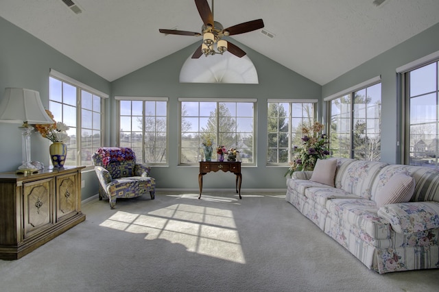 sunroom / solarium with visible vents, ceiling fan, and lofted ceiling