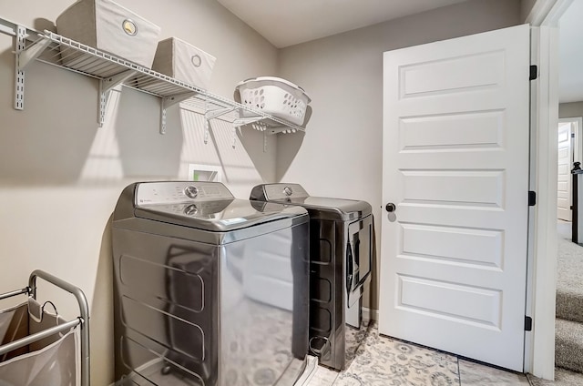 laundry area featuring laundry area and washing machine and dryer