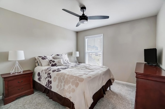 bedroom with carpet flooring, ceiling fan, and baseboards