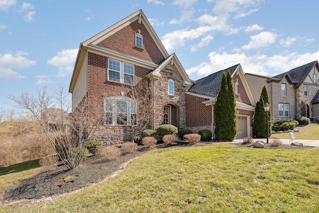 view of front facade featuring brick siding, a front lawn, concrete driveway, stone siding, and an attached garage