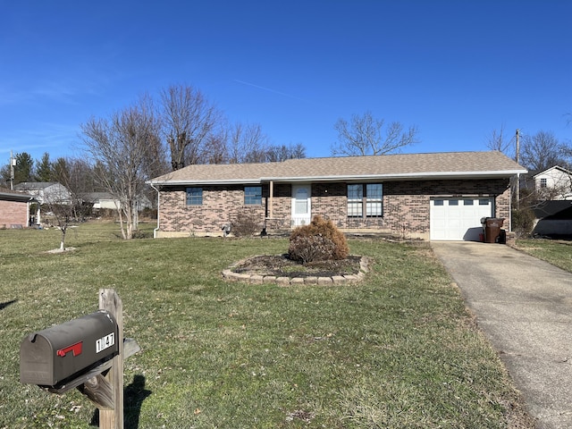 ranch-style house with driveway, a shingled roof, a front yard, an attached garage, and brick siding