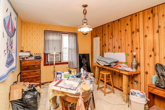home office with cooling unit and wallpapered walls