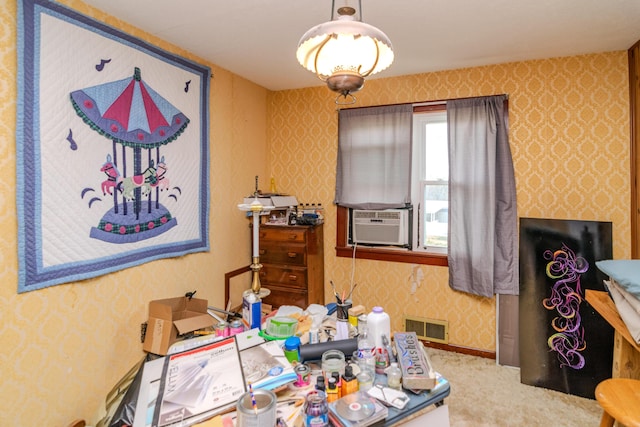 interior space with visible vents, cooling unit, and wallpapered walls