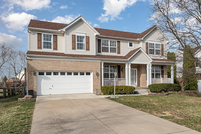 traditional-style house featuring brick siding, a porch, concrete driveway, and an attached garage