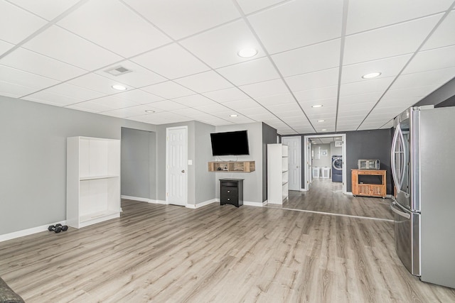 unfurnished living room with recessed lighting, visible vents, baseboards, and light wood-style flooring