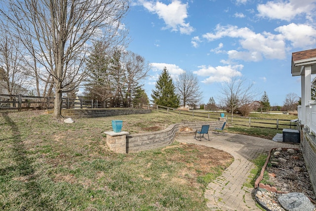 view of yard with a patio area and fence