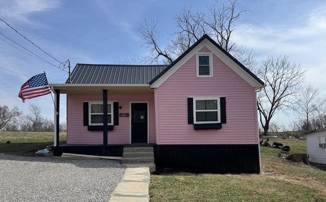 bungalow-style house with metal roof and covered porch