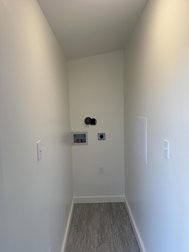 washroom featuring laundry area, hookup for a washing machine, electric dryer hookup, and baseboards