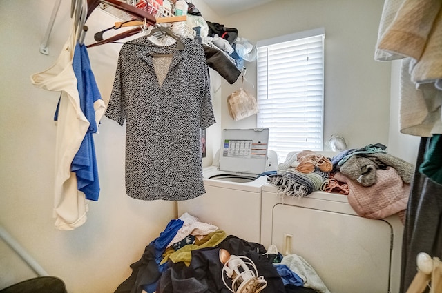 laundry room featuring washer and dryer and laundry area