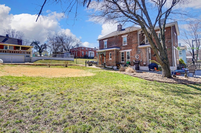 view of yard featuring a patio area and fence