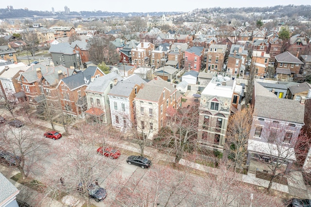 birds eye view of property with a residential view