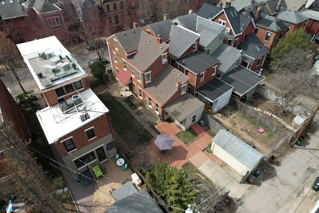 birds eye view of property with a residential view