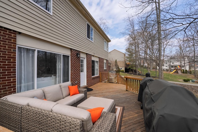 deck featuring an outdoor living space, a playground, and a grill