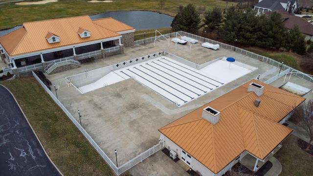 drone / aerial view with a water view