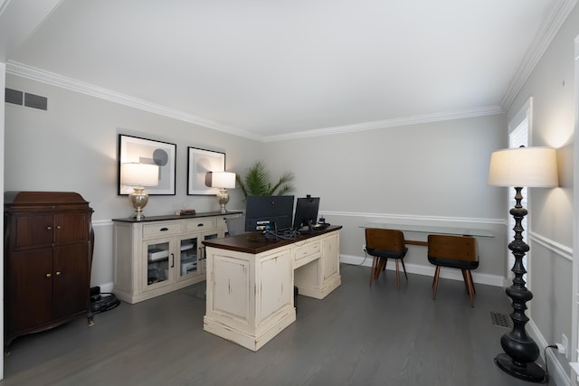 office with dark wood finished floors, visible vents, baseboards, and ornamental molding