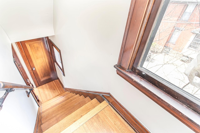 stairs featuring baseboards