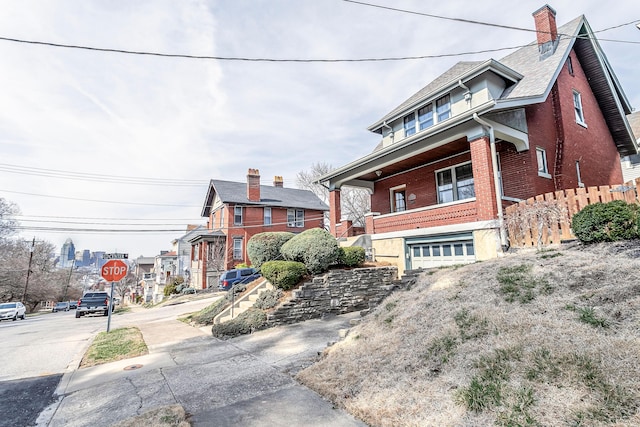 view of front of house featuring brick siding