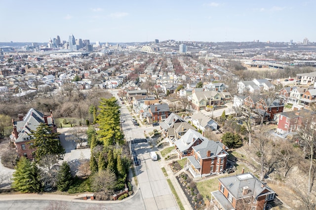 birds eye view of property with a view of city