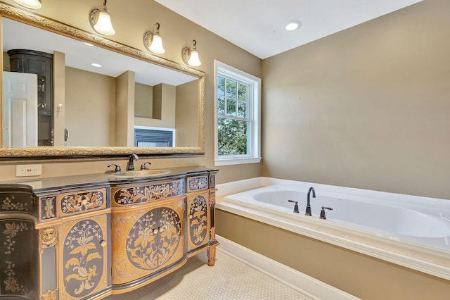 full bathroom featuring vanity and a garden tub