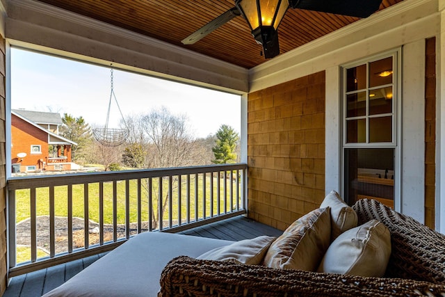 balcony featuring ceiling fan